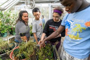 Students from PEOPLE program visit the Botany Greenhouse